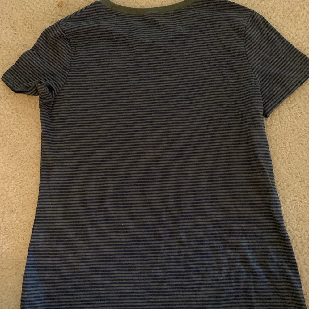 Green and blue striped shirt